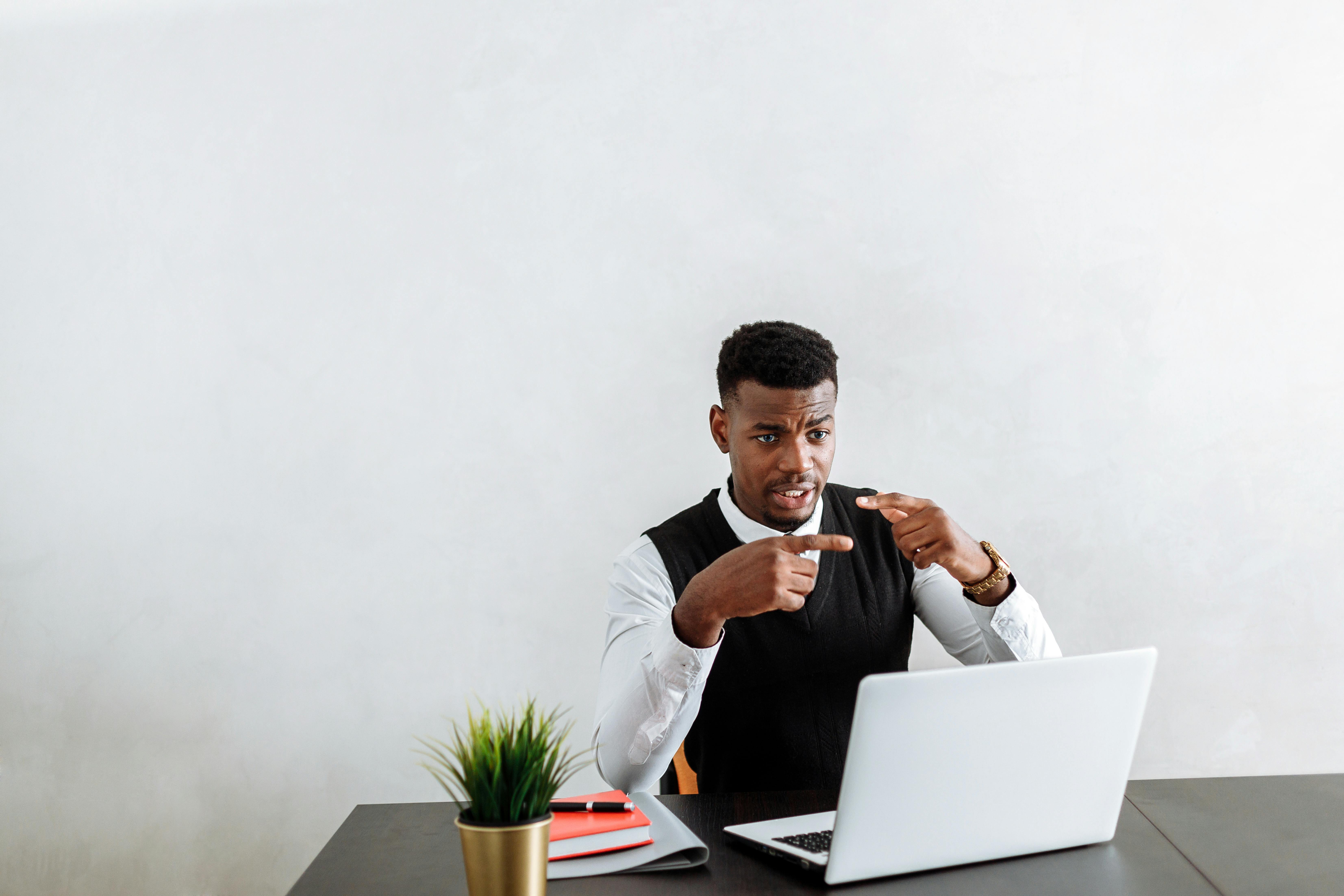 picture of a man working on a laptop